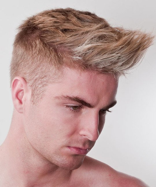 man assessing hair texture